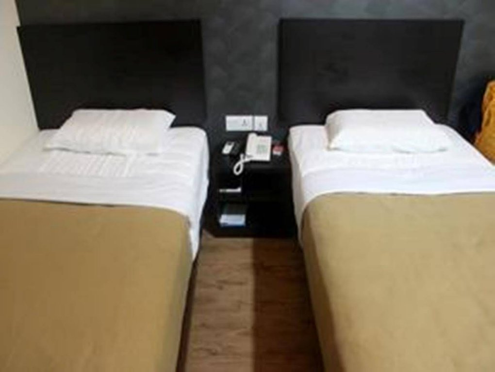 Фото Oyo 728 Tai Pan Hotel