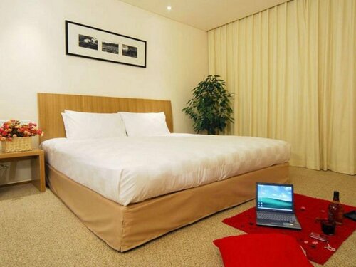 Гостиница Traveler Inn Huaqiao Beijing Hotel в Пекине