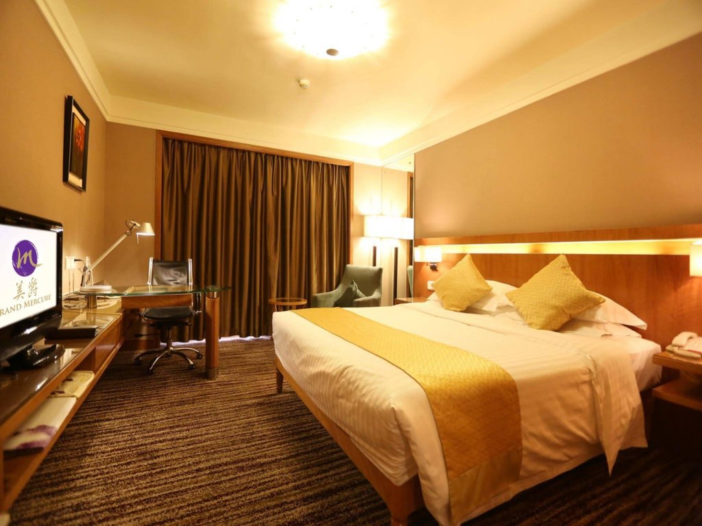 Фото Qingdao Kuaitong International Hotel