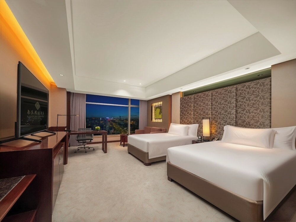 Фото Ningbo Nanyuan Universe Deluxe Hotel