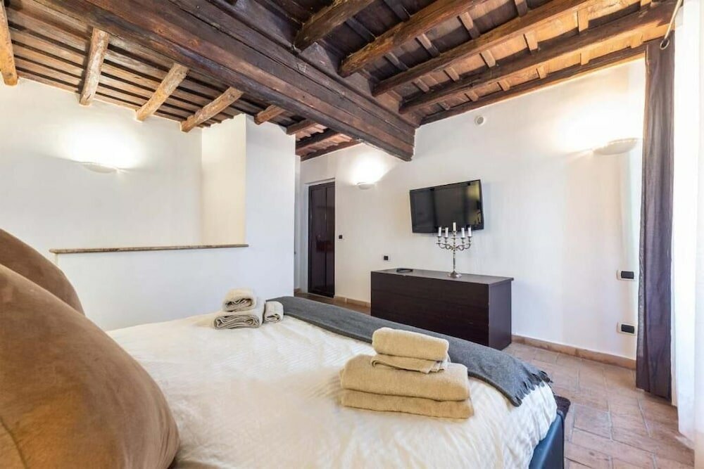 Фото Dimora ai Fori - Guesthouse