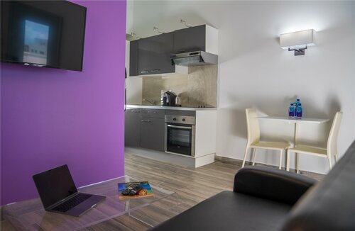 Гостиница Commodore Suites в Синт-Мартене