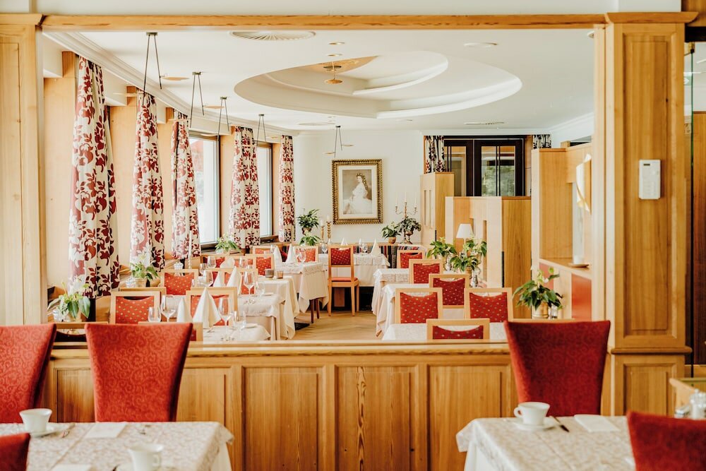 Фото Romantik Residenz Ferienwohnungen Hotel Im Weissen Rössl
