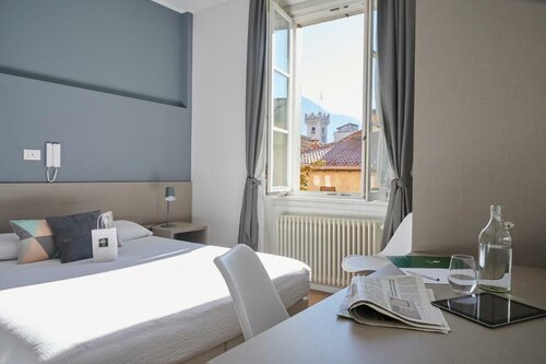 Гостиница Lainez Rooms & Suites в Тренто