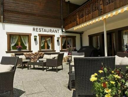Гостиница Hotel Alphorn Gstaad GmbH в Гштаде