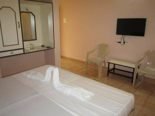 Гостиница Carina Beach Resort в Бенаулиме