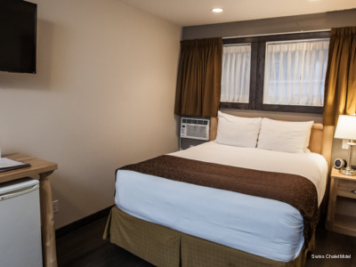 Фото Swiss Chalet Motel