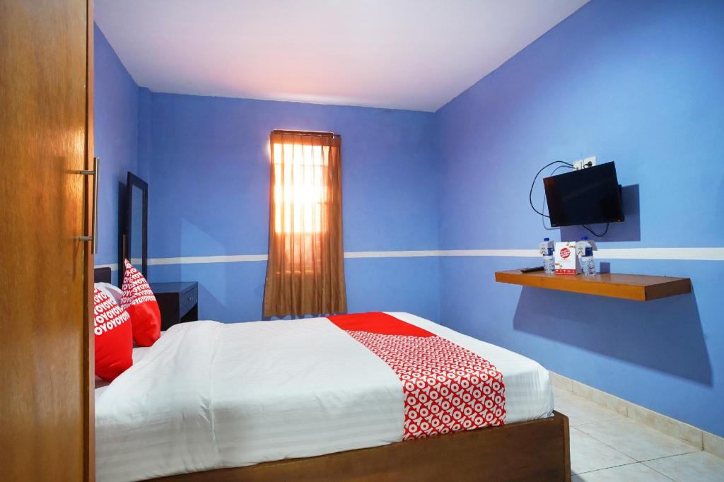 Фото Oyo 1272 Grand Garuda Guest House