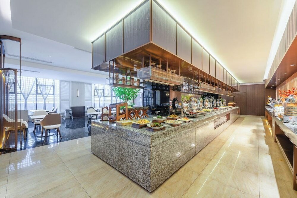 Фото Shanghai Maixinge International Hotel