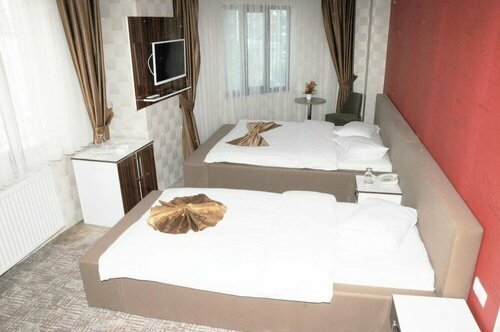 Гостиница Dosco Hotel в Тушбе