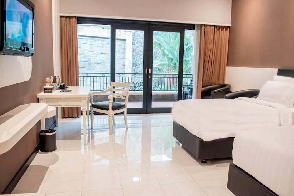 Фото Luminor Hotel Jember