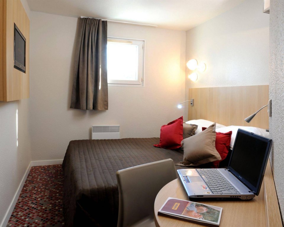 Фото Welcomotel Les Mureaux