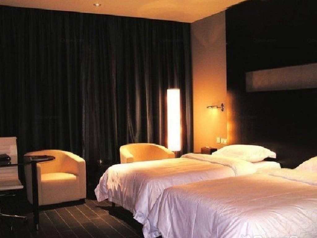 Фото Guangdong Nanmei Osotto Hotel