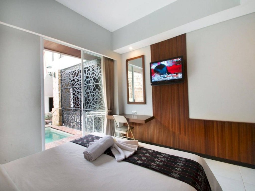 Фото Hadi Poetra Hotel