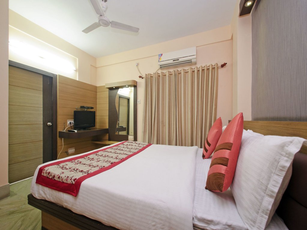 Фото Oyo 6606 Seacom Inn Purbadiganta