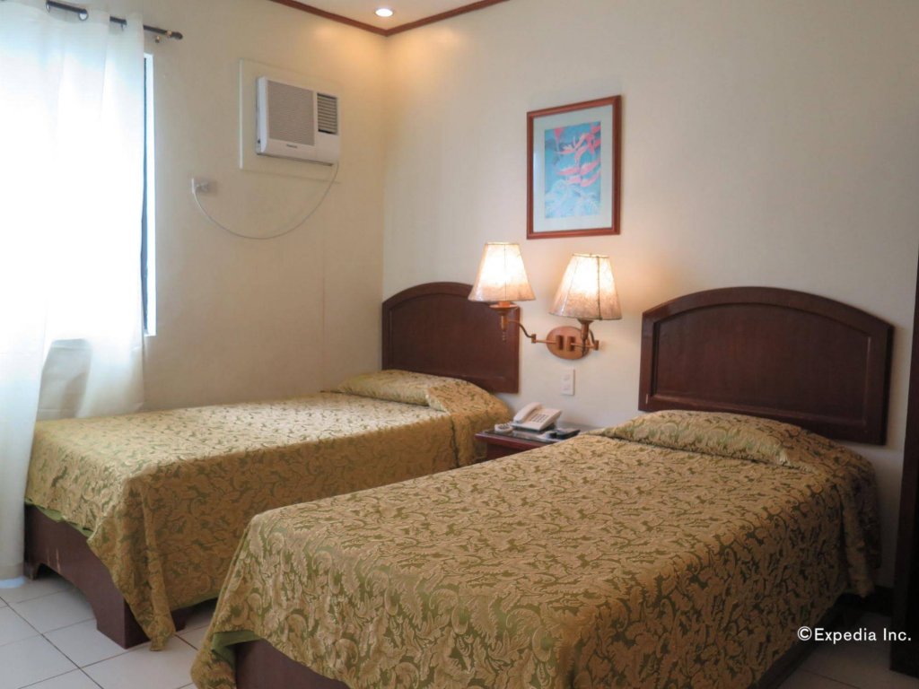 Фото Oyo 210 Apple Tree Suites