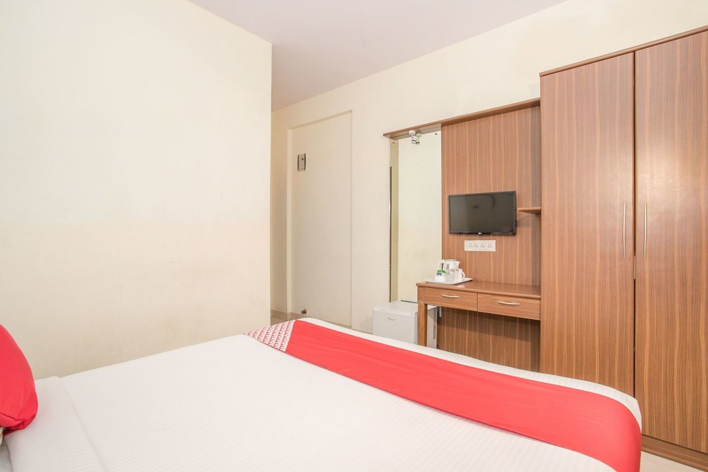 Фото Oyo 7669 The Trinitywood Hotel