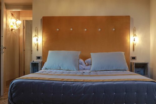 Гостиница Don Giulio Luxury Rooms в Мете