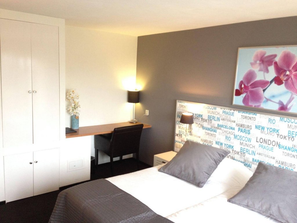 Фото Strandhotel Het Hoge Duin