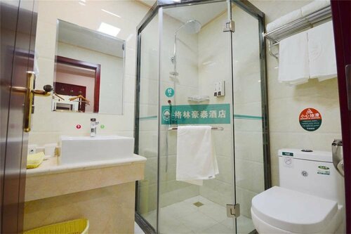 Гостиница GreenTree Inn Suzhou Si County Taoyuan Rd Hongcheng Garden Hotel в Сучжоу