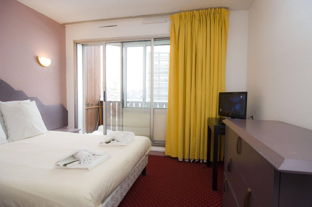 Фото Madame Vacances Hôtel Courchevel Olympic