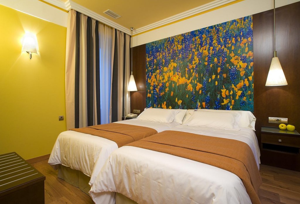 Фото Suites Gran VIA 44 Apartahotel