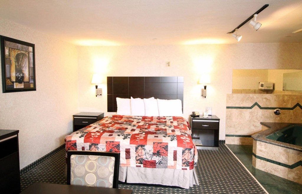 Фото Sunburst SPA & Suites Motel