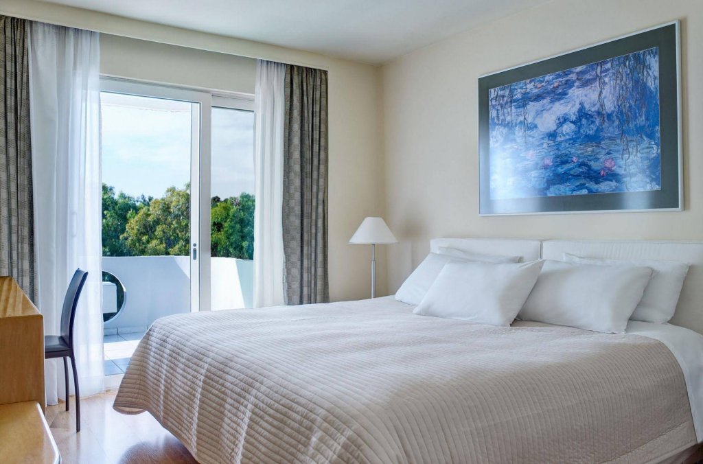 Фото Blazer Suites Hotel