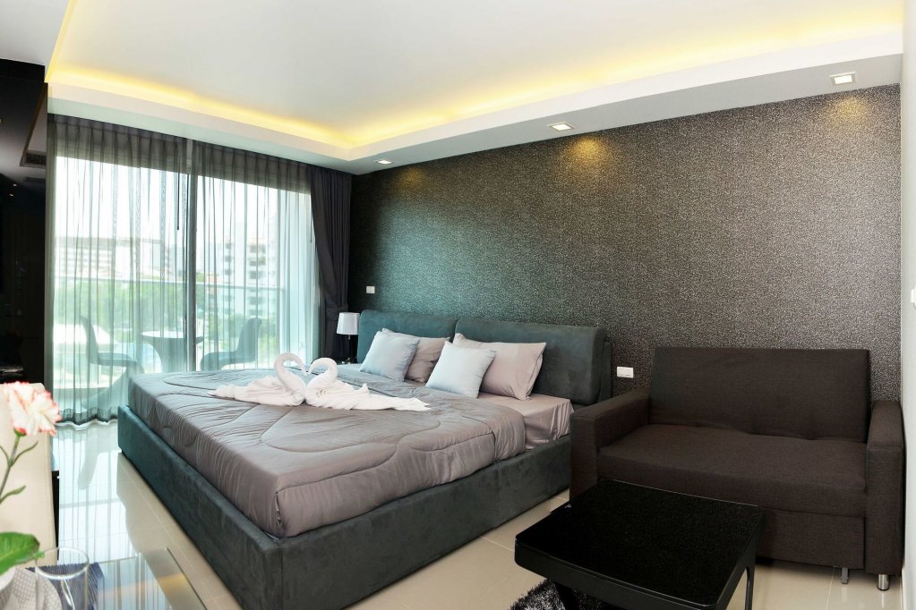 Фото Cosy Beach Condominium