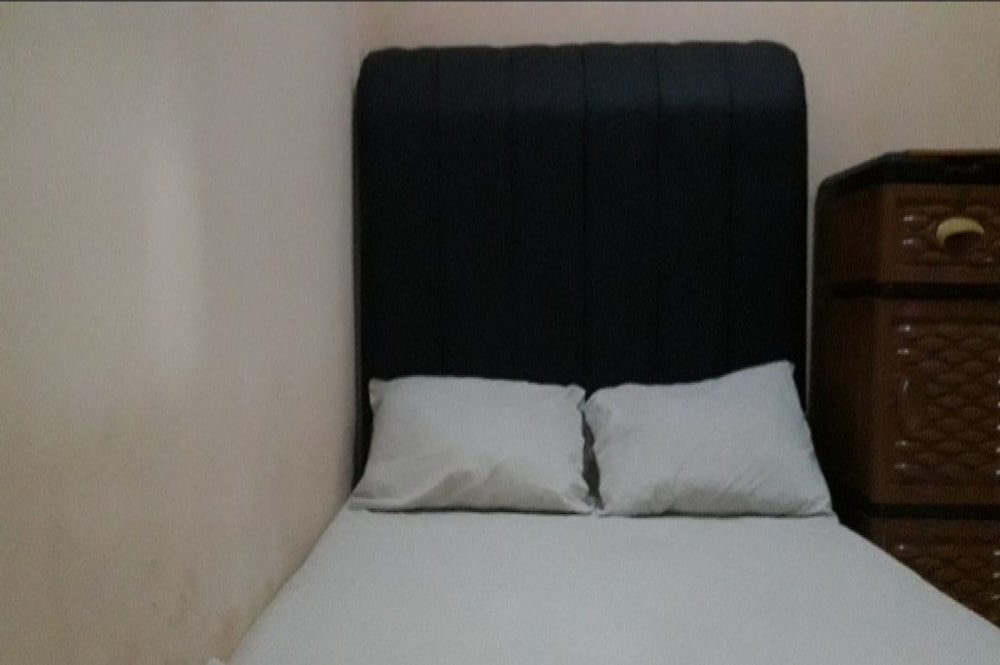 Фото Oyo 90706 Kost Alam Jaya Syariah