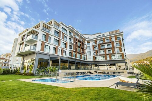 Гостиница Maia Luxury Beach Hotel & SPA в Кушадасы