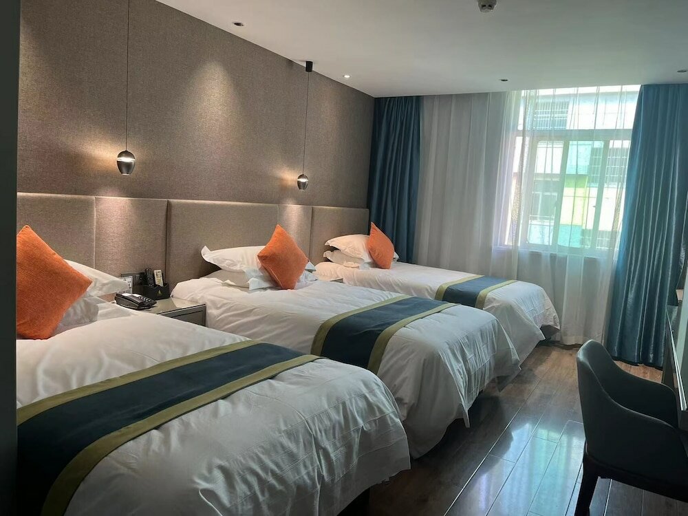 Фото Yiwu Manting City Hotel