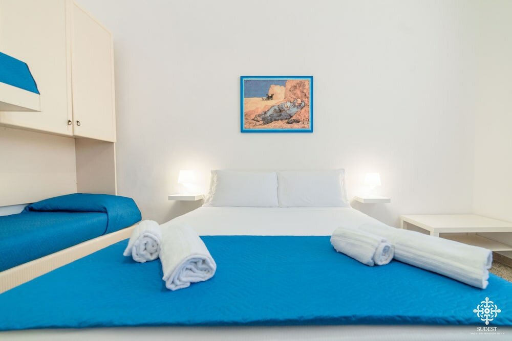 Фото Le 4 Perle Apartments