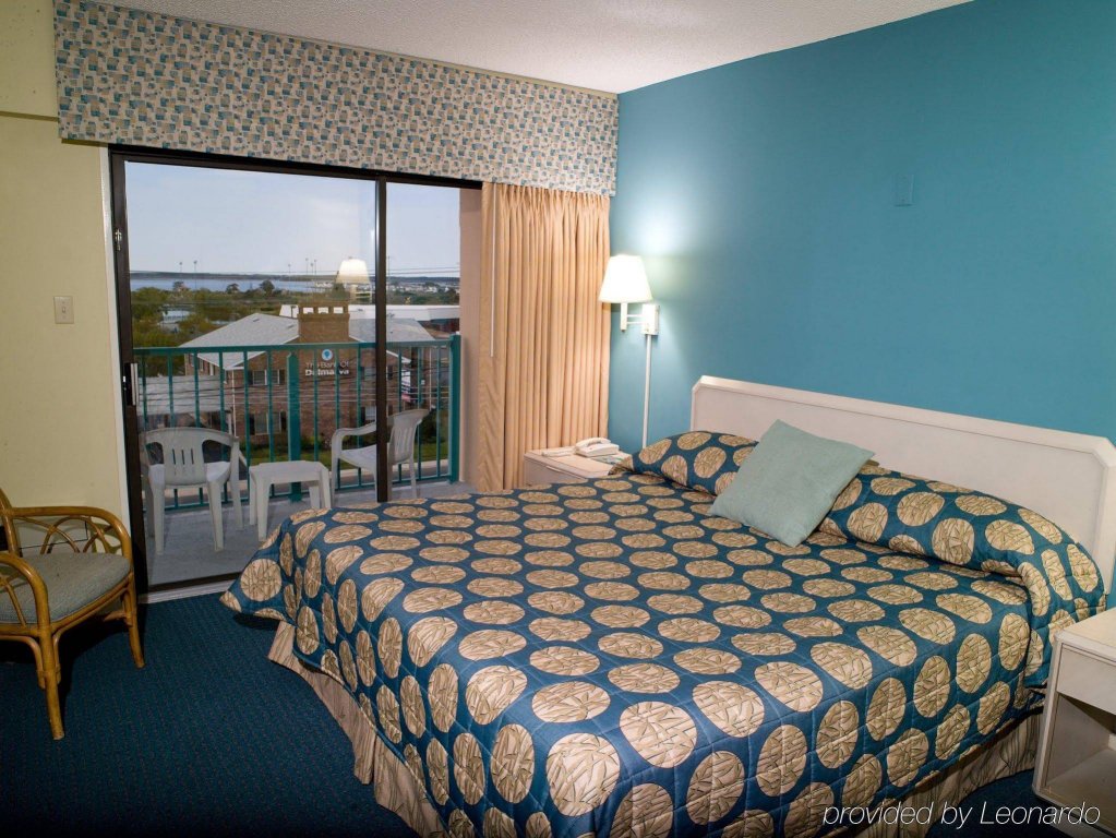 Фото Cayman Suites Hotel
