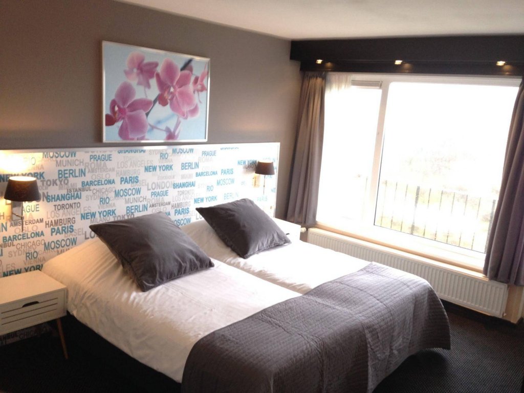 Фото Strandhotel Het Hoge Duin