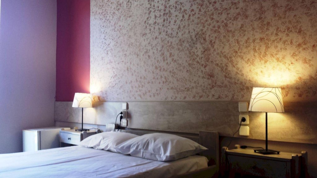 Фото Sunshine Inn Hotel