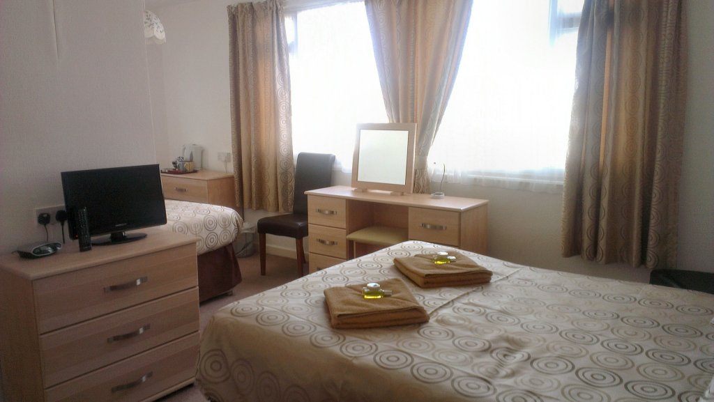 Фото Wayside Cheer Hotel