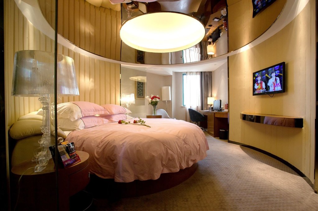 Фото Yiwu Wendemu International Hotel