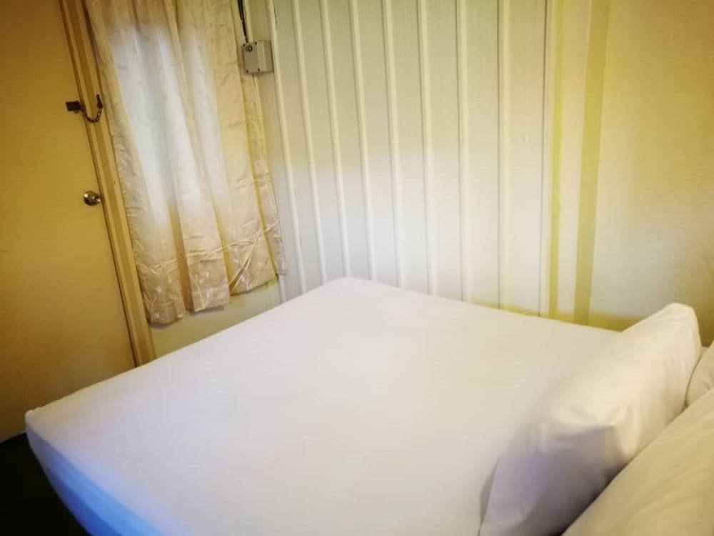 Фото Grocers Inn Backpackers