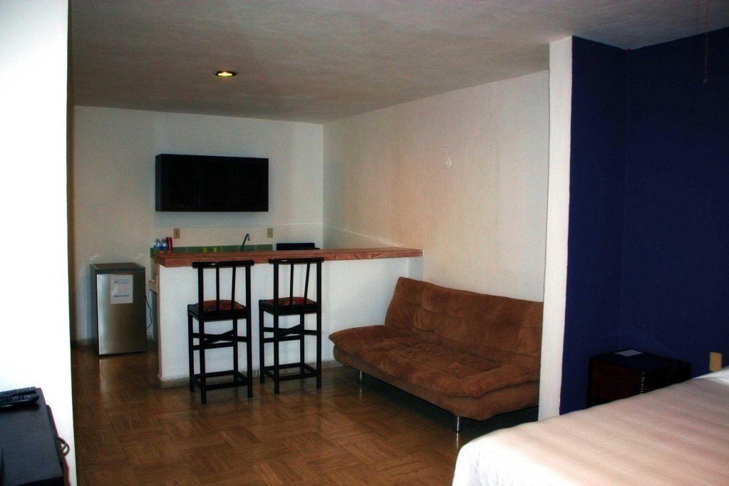 Фото Playa Suites