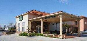 Гостиница Mid City Inn and Suites
