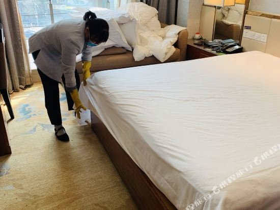 Фото Yiwu Wendemu International Hotel