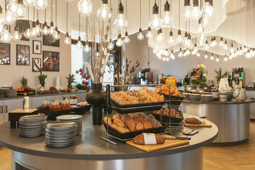 Гостиница Holiday Inn - the niu в Зиндельфингене