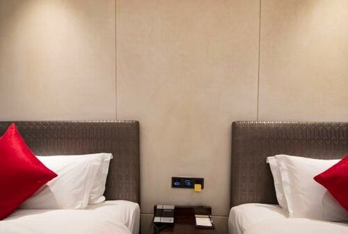 Гостиница Wanshanhong Hotel в Тунжэни