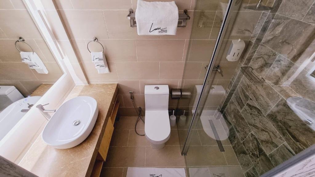 Фото Luau Beach Inn