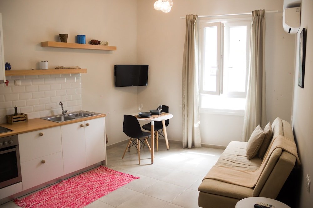 Фото The Central Boutique Αpartments