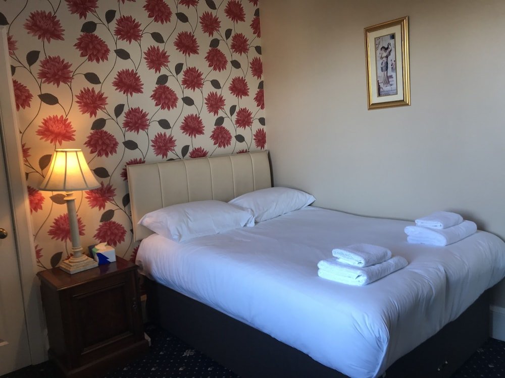 Фото The Alexander Guest House