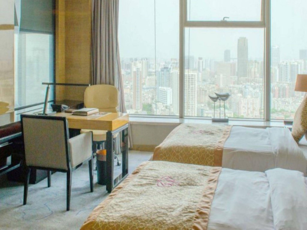 Фото Tangla Hotel Tianjin