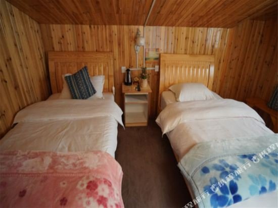 Фото 7 Days Inn Diqing Shangri-la Old Town Branch