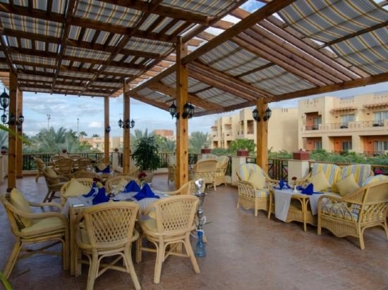 Фото Swiss Inn Pyramids Golf Resort